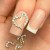 5903990597008-OZDOBY-DO-PAZNOKCI-MOLLY-NAILS-SERCE-3D-WHITE-DIAMOND-10szt-2.jpg